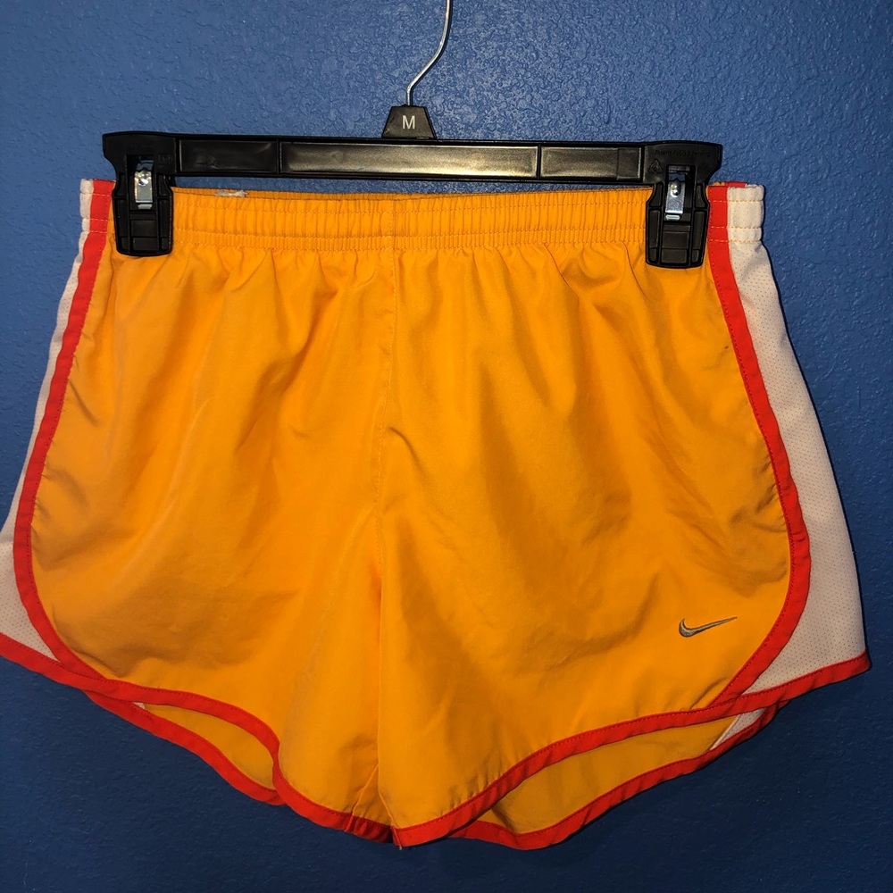 Orange Nike shorts(size: small)
